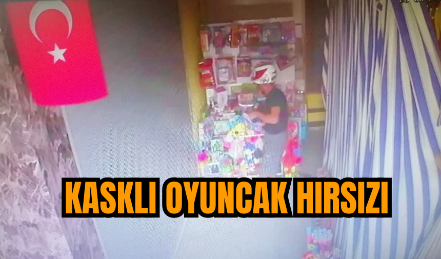 Kasklı oyuncak hırsızı kameraya yakalandı