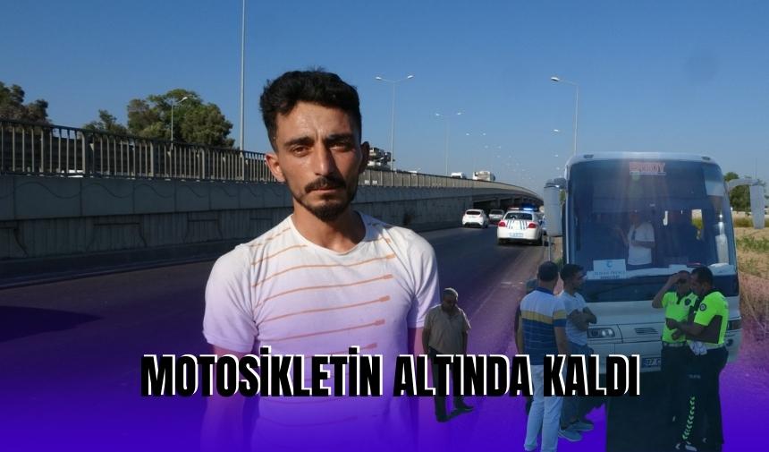 MOTOSİKLETİN ALTINDA KALDI