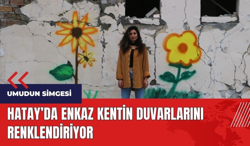 Hatay'da enkaz kentin duvarlarını renklendiriyor