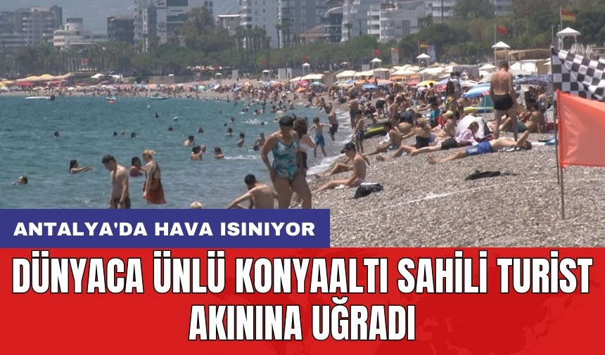 Antalya'da hava ısınıyor: Dünyaca ünlü Konyaaltı Sahili turist akınına uğradı