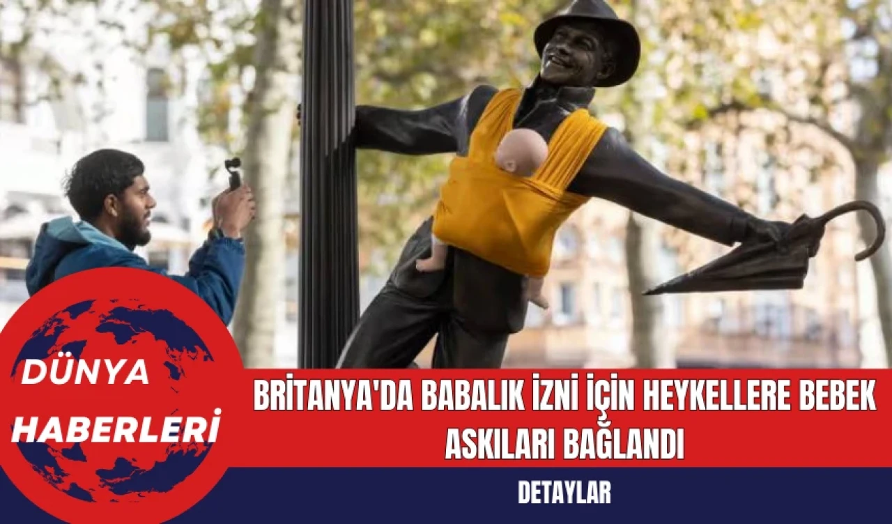 Britanya'da Babalık İzni İçin Heykellere Bebek Askıları Bağlandı