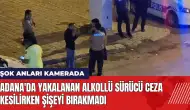 Adana'da yakalanan alkollü sürücü ceza kesilirken şişeyi bırakmadı