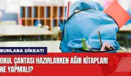 Okul çantası hazırlarken ağır kitapları ne yapmalı?