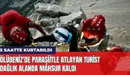 Ölüdeniz'de paraşütle atlayan turist dağlık alanda mahsur kaldı