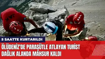 Ölüdeniz'de paraşütle atlayan turist dağlık alanda mahsur kaldı