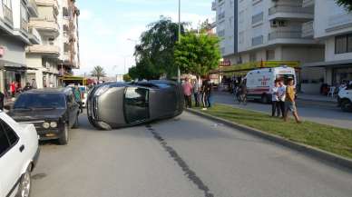 Otomobil park halindeki araca çarparak takla attı