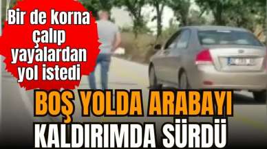 Boş yolda kaldırıma çıktı, yayalardan yol istedi