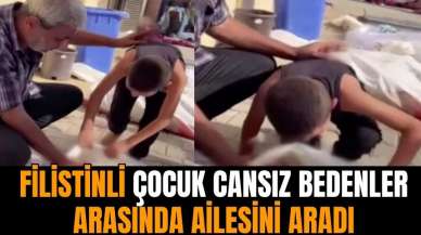 Filistinli çocuk cansız bedenler arasında ailesini aradı