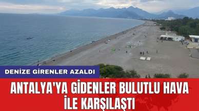 Antalya'ya gidenler bulutlu hava ile karşılaştı: Denize girenler azaldı