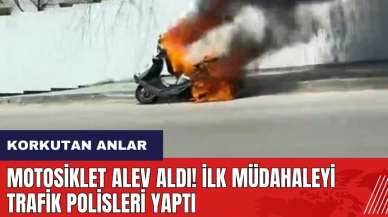 Motosiklet alev aldı! İlk müdahaleyi trafik polisleri yaptı