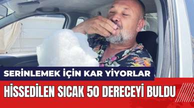 Hissedilen sıcak 50 dereceyi buldu! Serinlemek için kar yiyorlar