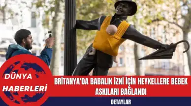 Britanya'da Babalık İzni İçin Heykellere Bebek Askıları Bağlandı